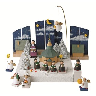 Figurengruppe im Weihnachtsland mit Kulisse Im Schnee